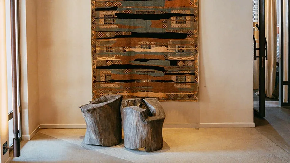 A wall panel and stump stools